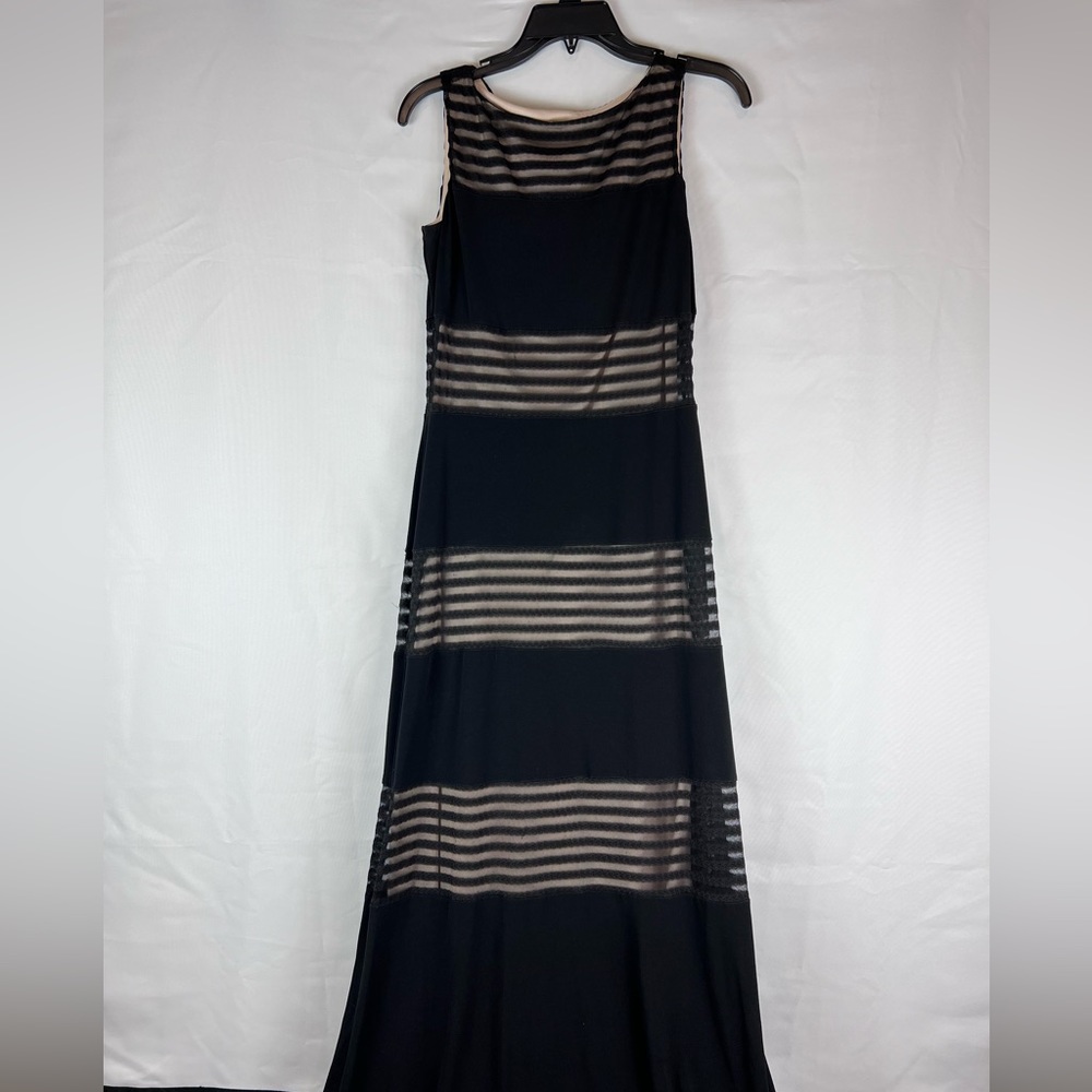 Black Jersey floor length dress with mesh stripes over nude liner.